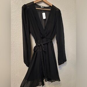 Black long sleeve skater dress with waist tie